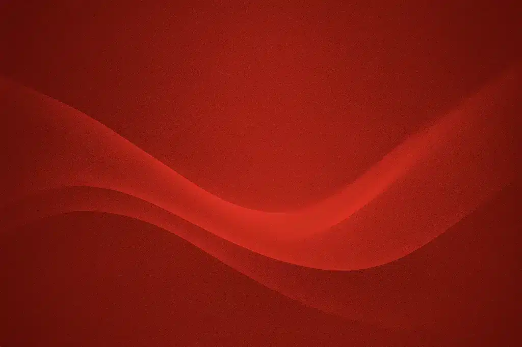 Abstract red background with flowing, wave-like shapes.